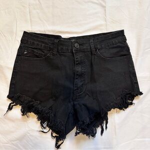 Short black frayed booty shorts.